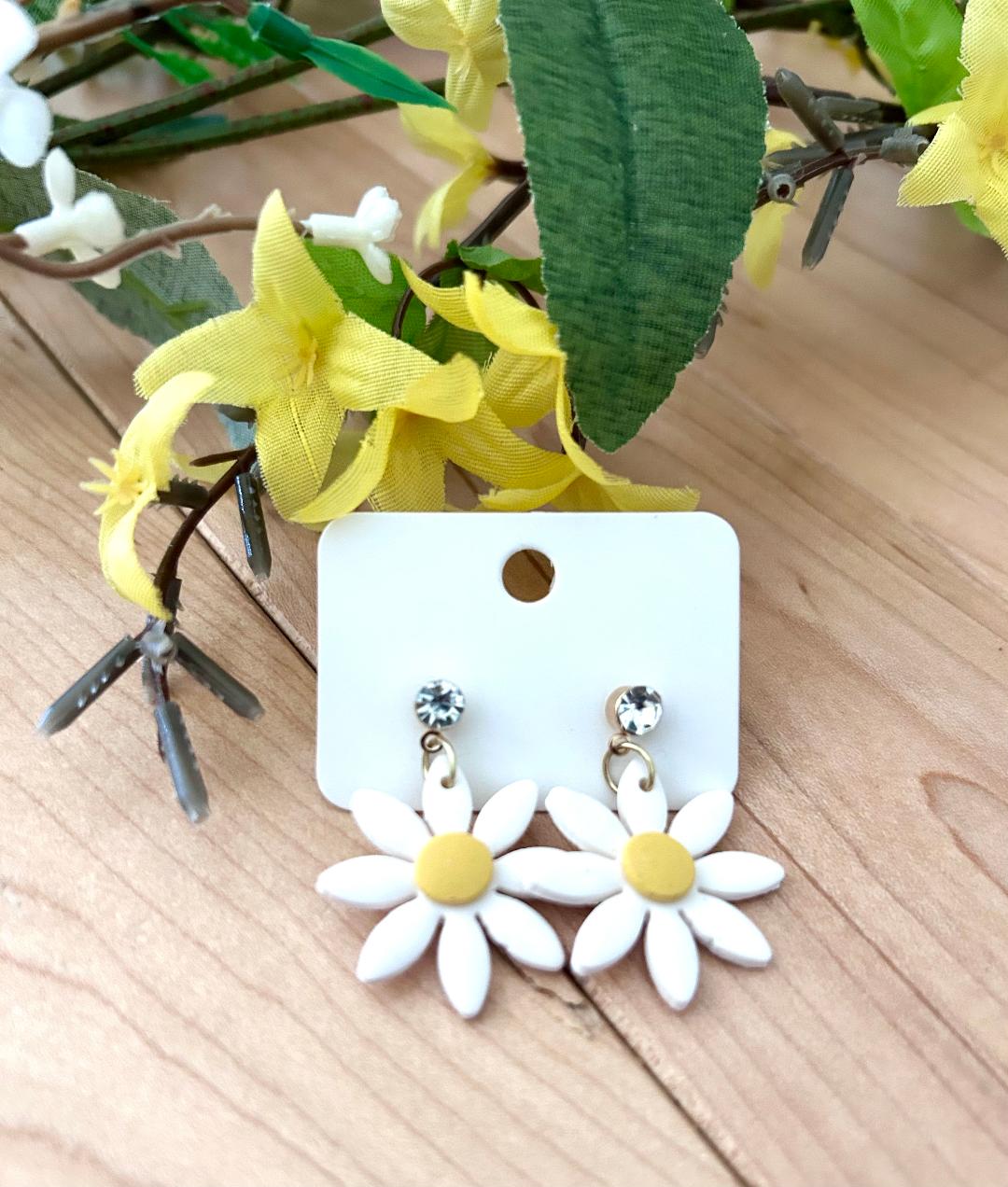 Daisy dangles with a rhinestone stud